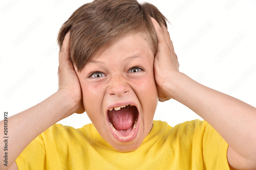 Вad mood.Emotional boy on a white background. Portrait of a teenager. Вad mood.Emotional boy on a white background. Portrait of a teenager.
