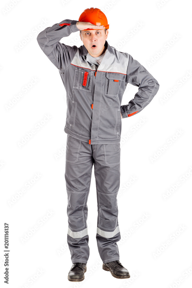 Full length portrait of a male builder over white wall background. repair, construction, building, people and maintenance concept. Full length portrait of a male builder over white wall background. repair, construction, building, people and maintenance concept.