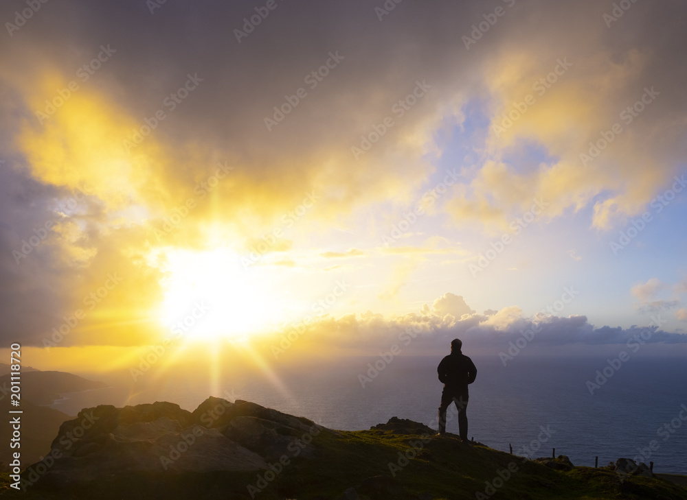 Silhouette Of Man Watching sunset Over Sea, Mount Jaizkibel, Basque Country