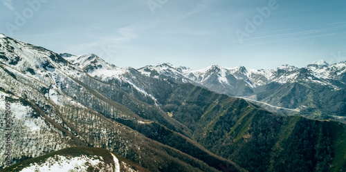Aerial view of mountains and snowy peaks