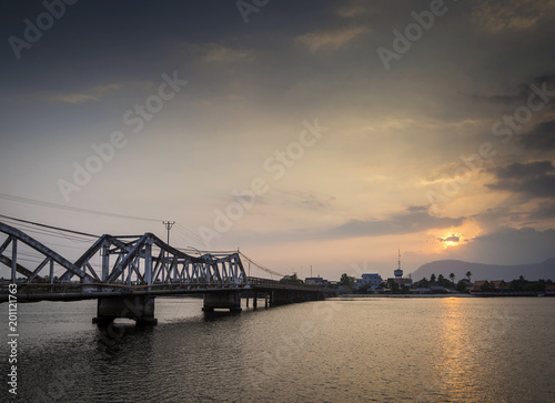 bridge and river at sunset in kampot cambodia