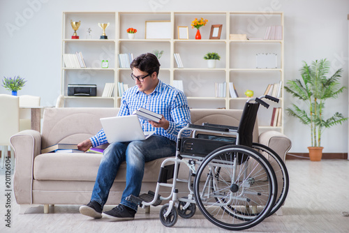 Young student on wheelchair in disability concept