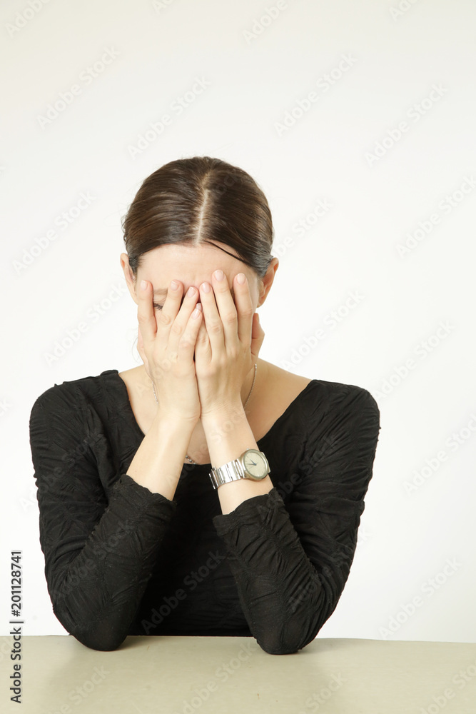 Portrait of young woman covering her face
Portrait of young woman covering her face