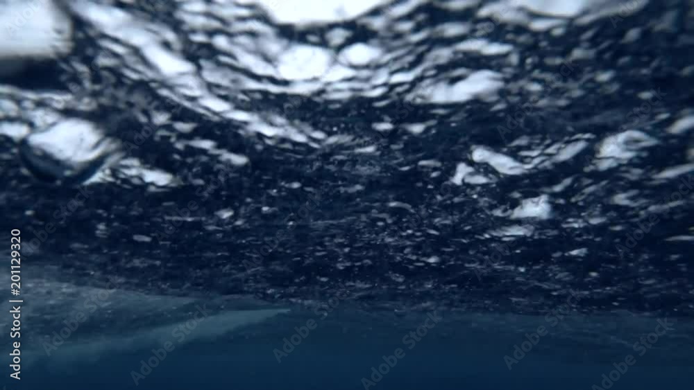 Strong tropical downpour in ocean, underwater view
Strong tropical downpour in ocean, underwater view