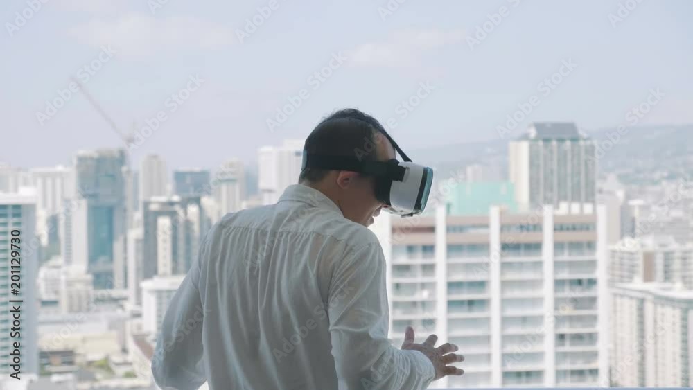 Professional video of man playing game in virtual reality glasses in 4k slow motion 60fps Professional video of man playing game in virtual reality glasses in 4k slow motion 60fps