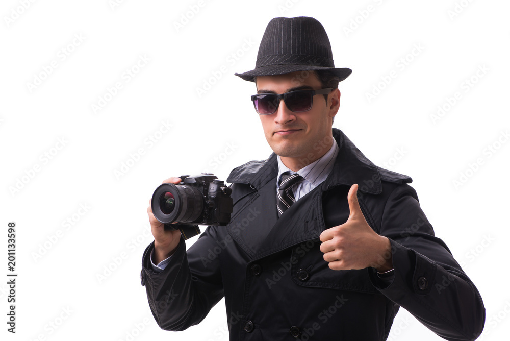 Spy with camera taking pictures isolated on white Spy with camera taking pictures isolated on white
