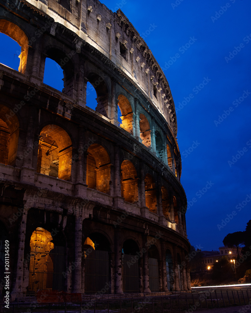 Coliseum facade, shortly before sunrise. Rome, Italy.