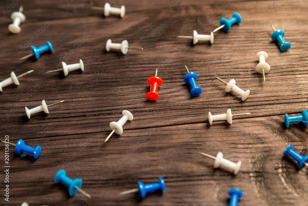 multicolored buttons on brown wooden background multicolored buttons on brown wooden background