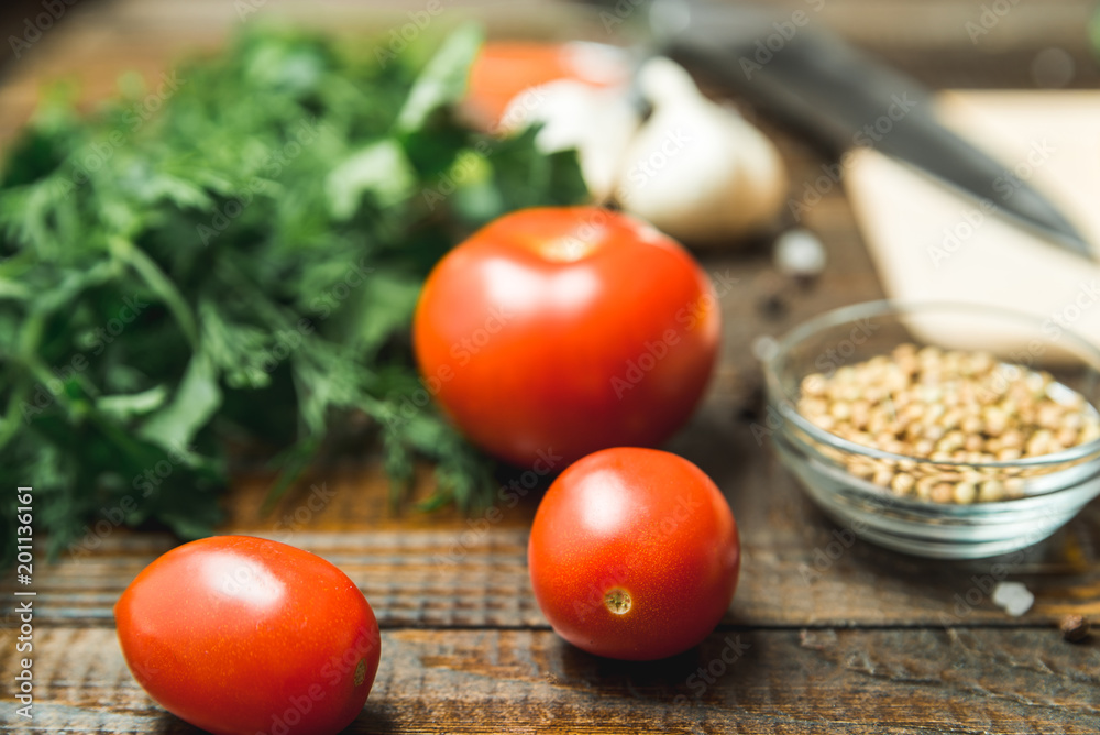 vegetables, herbs and seasonings lie on the table vegetables, herbs and seasonings lie on the table