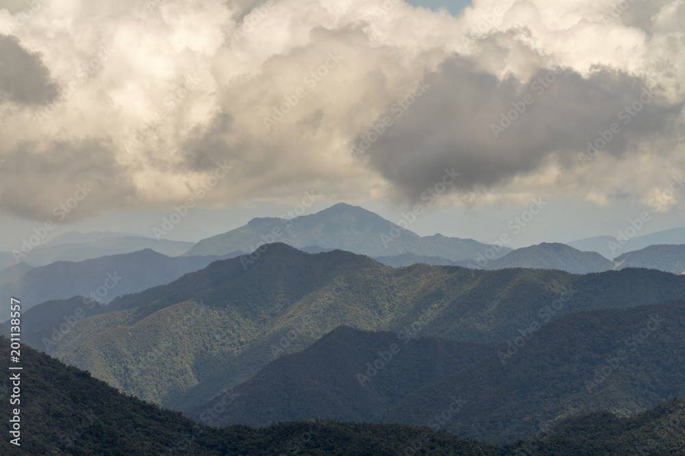 Cumulus clouds forming over the Cordillera del Condor on the border of Ecuador with Peru. This pristine mountain range is a site of exceptional plant and animal biodiversity.