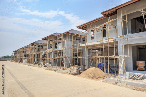 house under construction with autoclaved aerated concrete block structure at building site