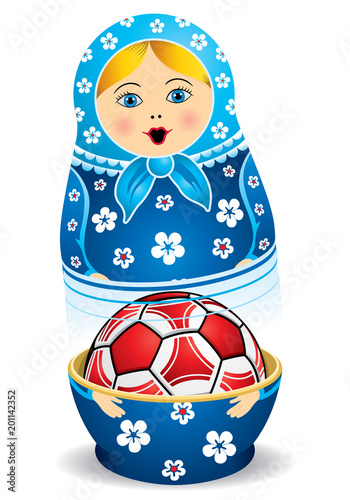 Blue matryoshka opening with a red soccer ball inside it on white background. Matryoshka doll also known as a Russian nesting doll is a set of wooden dolls of decreasing size placed 