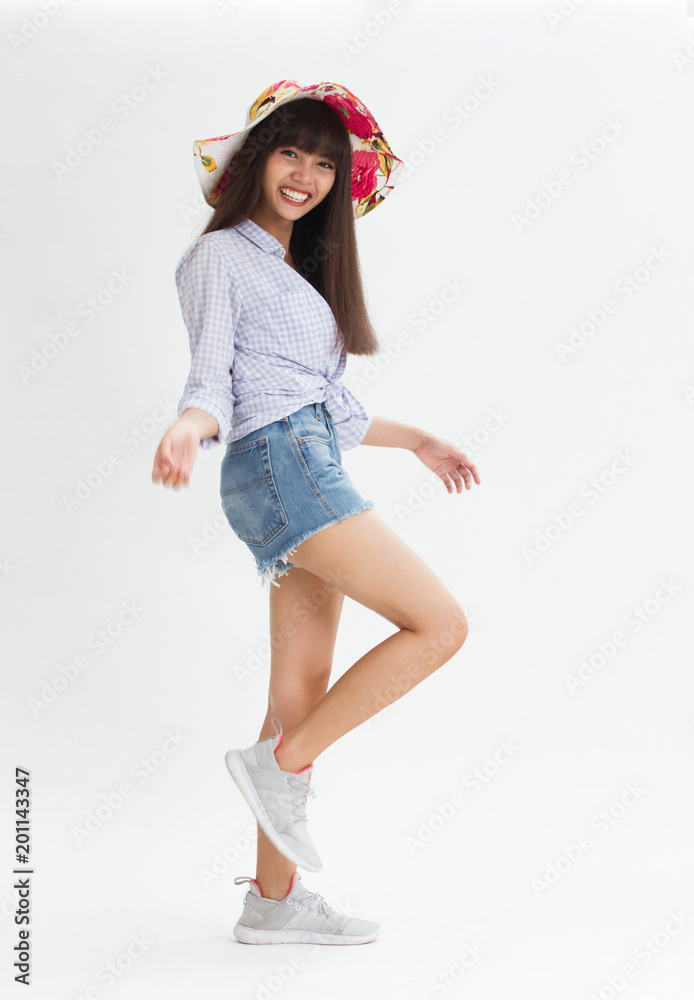 Young Thai girl smiling and joyful lifestyle on white background Young Thai girl smiling and joyful lifestyle on white background