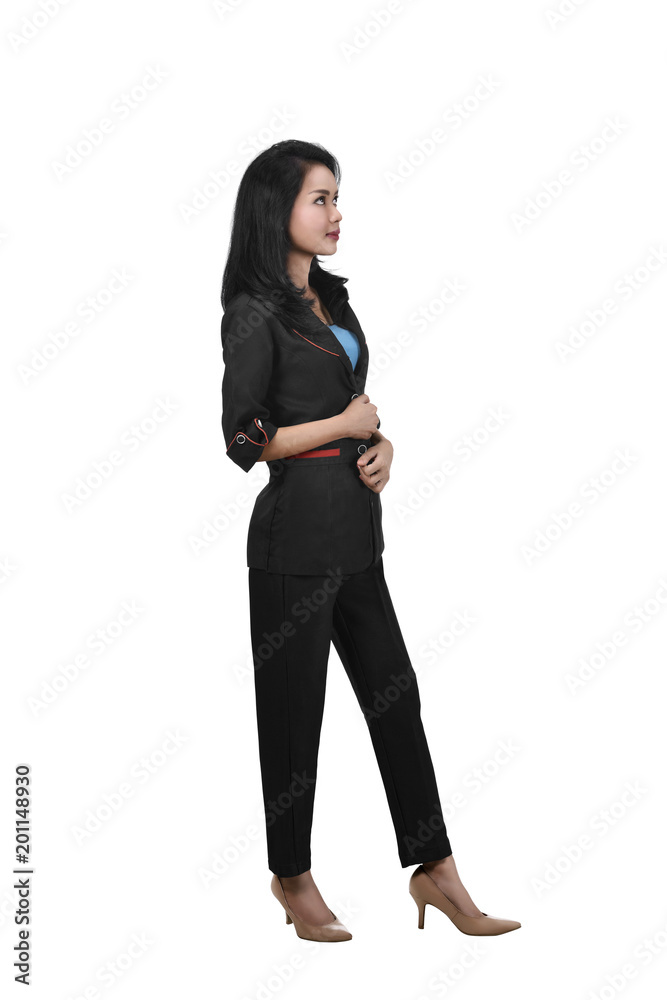 Image of asian business woman standing while looking up Image of asian business woman standing while looking up