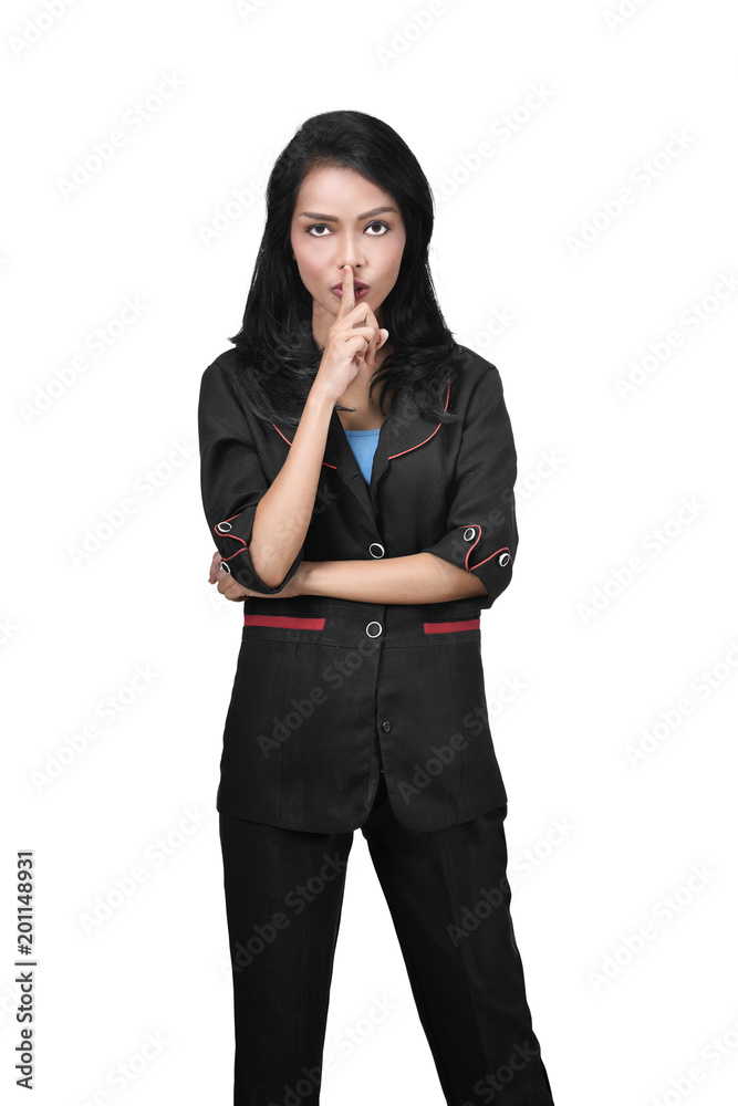 Image of asian business woman with silence gesture Image of asian business woman with silence gesture