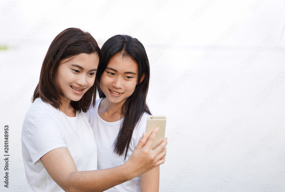 Young asian woman selfie with smile and happy feelling, selective focus Young asian woman selfie with smile and happy feelling, selective focus