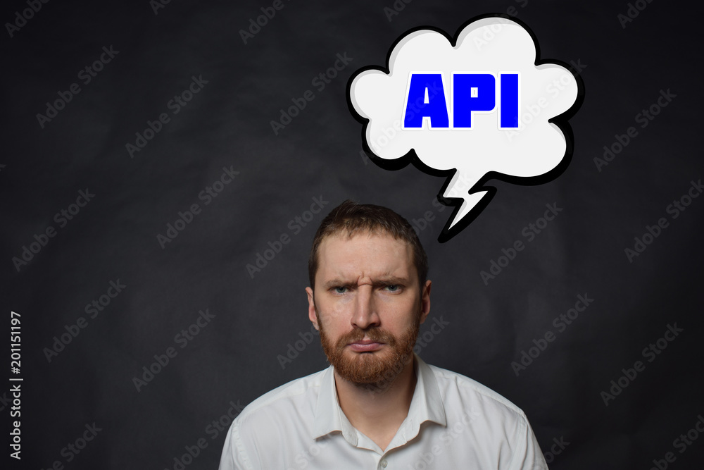 Above the businessman hangs a cloud with the inscription:API Above the businessman hangs a cloud with the inscription:API