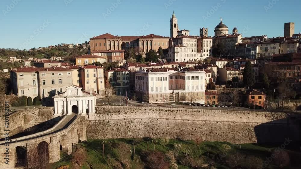 Drone aerial view of Bergamo, The Old city. One of the beautiful city in Italy. Landscape on the old gate San Giacomo and historical buildings Drone aerial view of Bergamo, The Old city. One of the beautiful city in Italy. Landscape on the old gate San Giacomo and historical buildings
