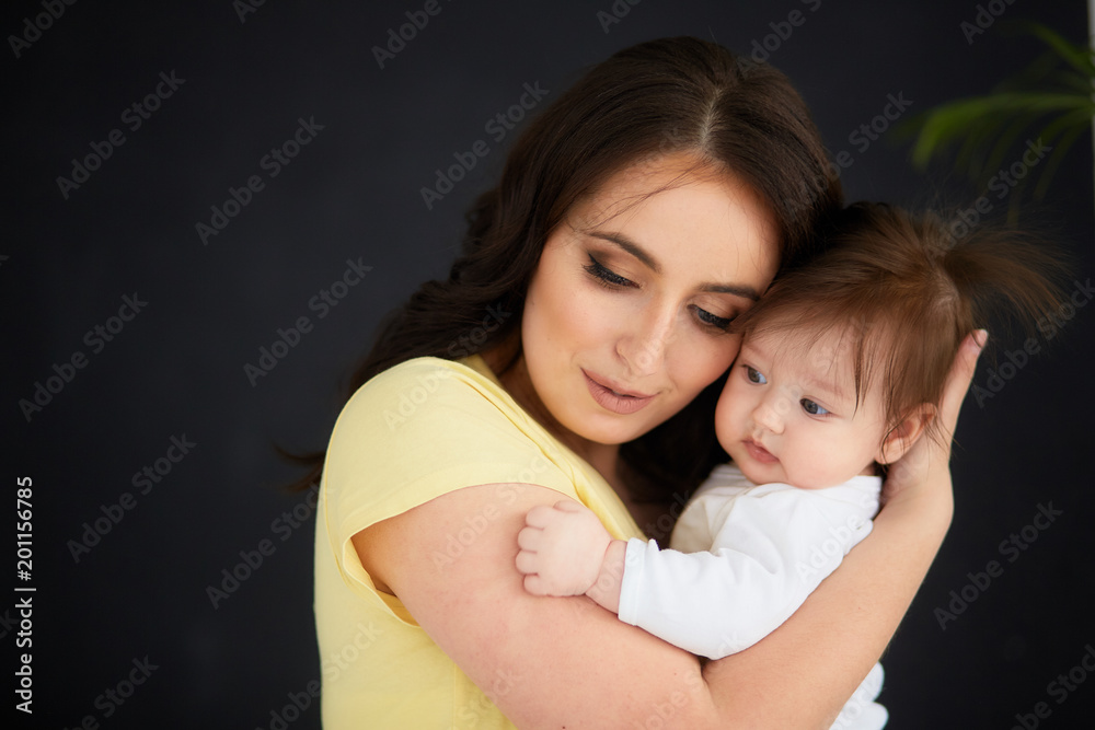 The happinest mother embracing her daughter The happinest mother embracing her daughter