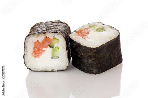 Sushi roll isolated on white background with reflection. Creative layout made of sushi. Flat lay. Food concept. Macro concept.