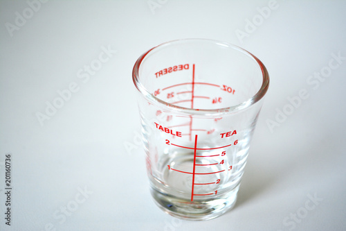 Obraz na plátně Measuring Small Quantities on white background
