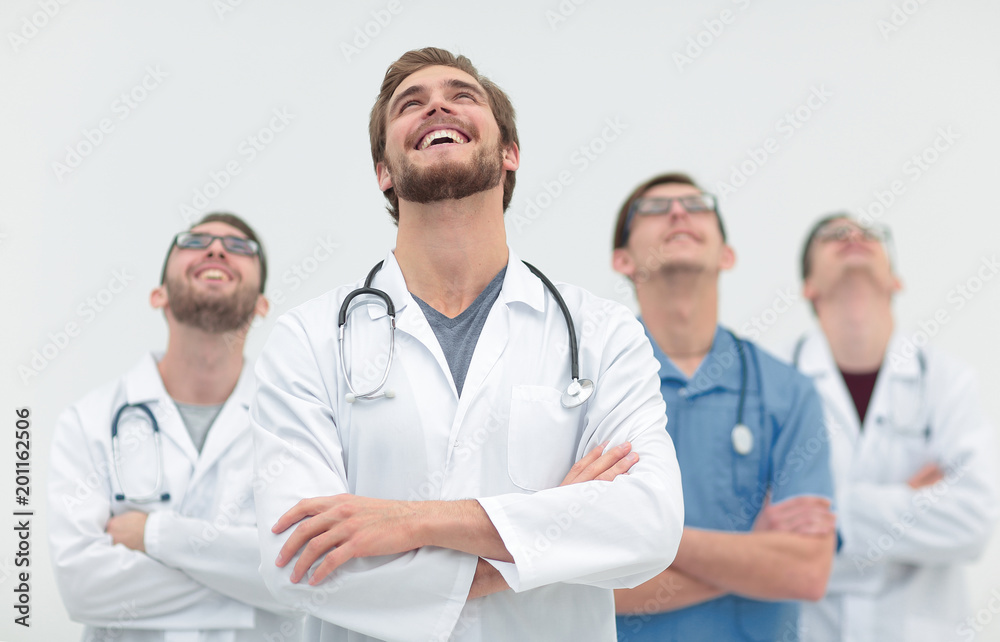talented doctor looking at the top, on the copy space talented doctor looking at the top, on the copy space