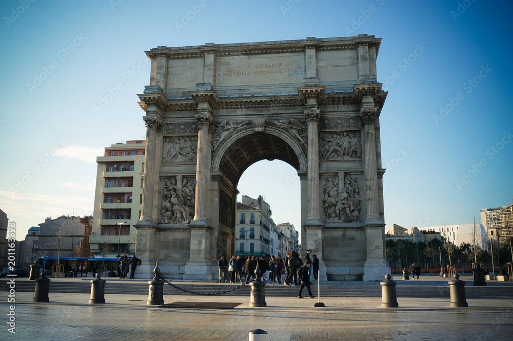 Porte d'Aix arch on sunset in Marseillie, France. March 2018