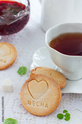 Homemade shortbread cookie with the inscription in Russian 