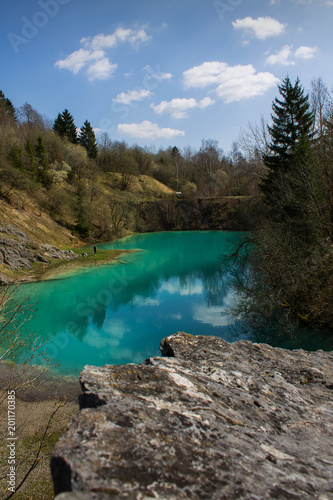 Beautiful blue mountain lake. The Blue Colour is caused by former limestone mining. (Blauer See, Hüttenrode near Blankenburg, National Park Harz in Germany