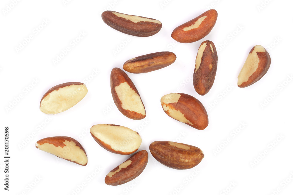 Brazil nuts isolated on white background closeup. Top view. Flat lay Brazil nuts isolated on white background closeup. Top view. Flat lay