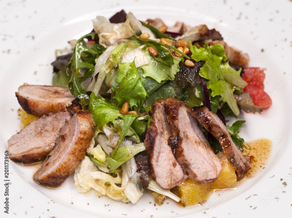Restaurant dish meat salad from pork and arugula Restaurant dish meat salad from pork and arugula