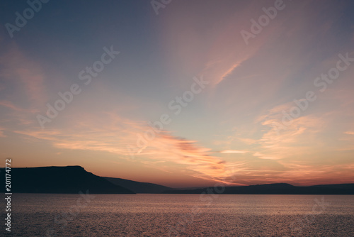 Scenic sunset on the lake © nazariykarkhut