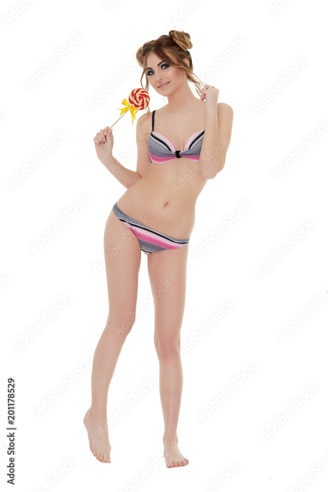 Fototapeta premium Young woman with lollipop.