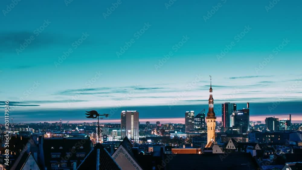 Tallinn, Estonia, Europe. Time Lapse Time-lapse Of Cityscape. Transition From Night To Morning Sunrise. Old Town And Modern City. Famous Landmarks. UNESCO. Zoom In Tallinn, Estonia, Europe. Time Lapse Time-lapse Of Cityscape. Transition From Night To Morning Sunrise. Old Town And Modern City. Famous Landmarks. UNESCO. Zoom In