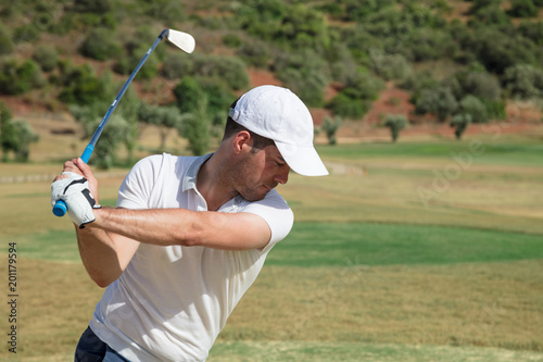 Professional golfer at golf course