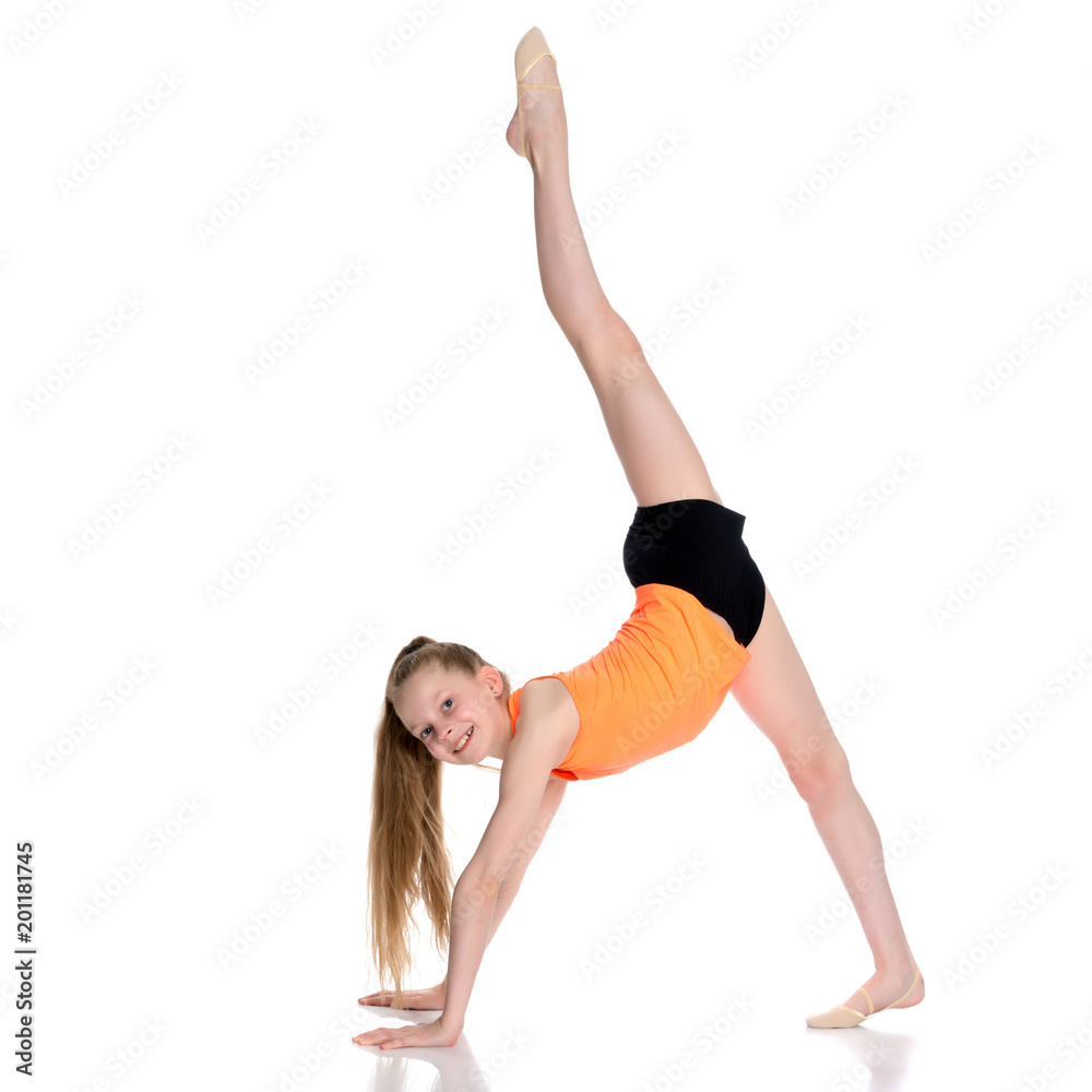 The gymnast perform an acrobatic element on the floor.
