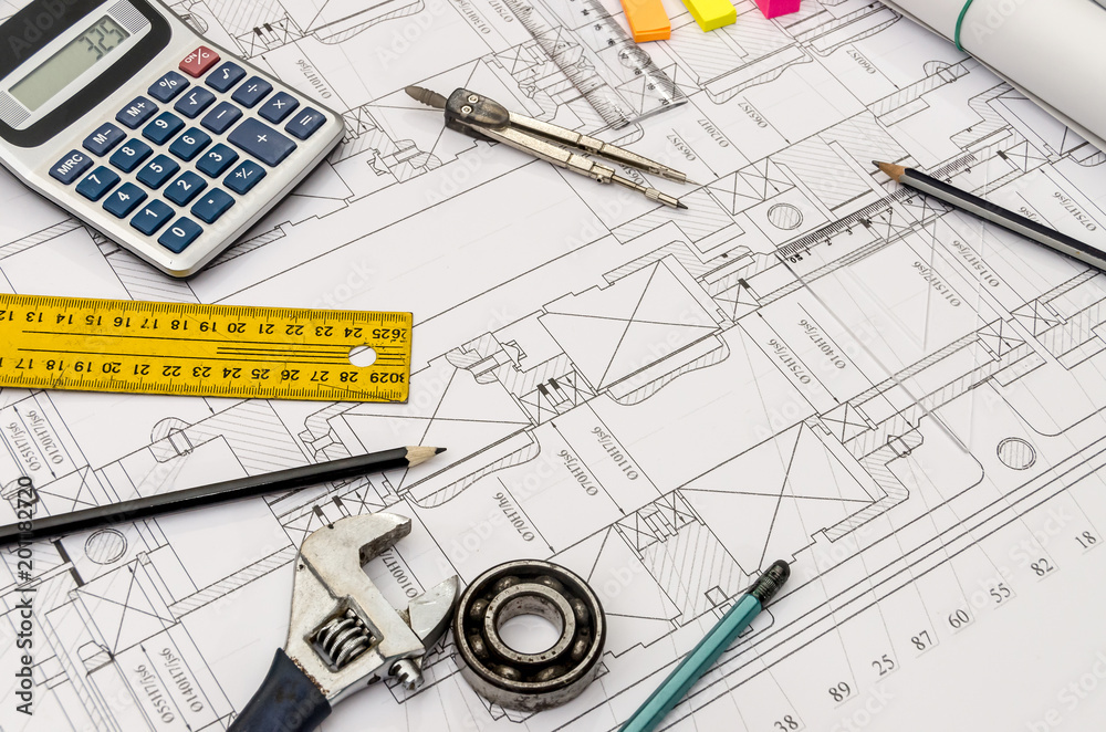 Engineering drawing with different tool on it Engineering drawing with different tool on it