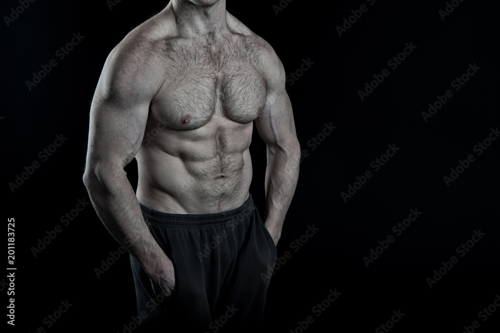 Training and workout activity in gym. Torso with six pack and ab muscles. Arms with strong biceps and triceps. Fit belly and athletic chest. Fitness sport and wellness concept, vintage, copy space