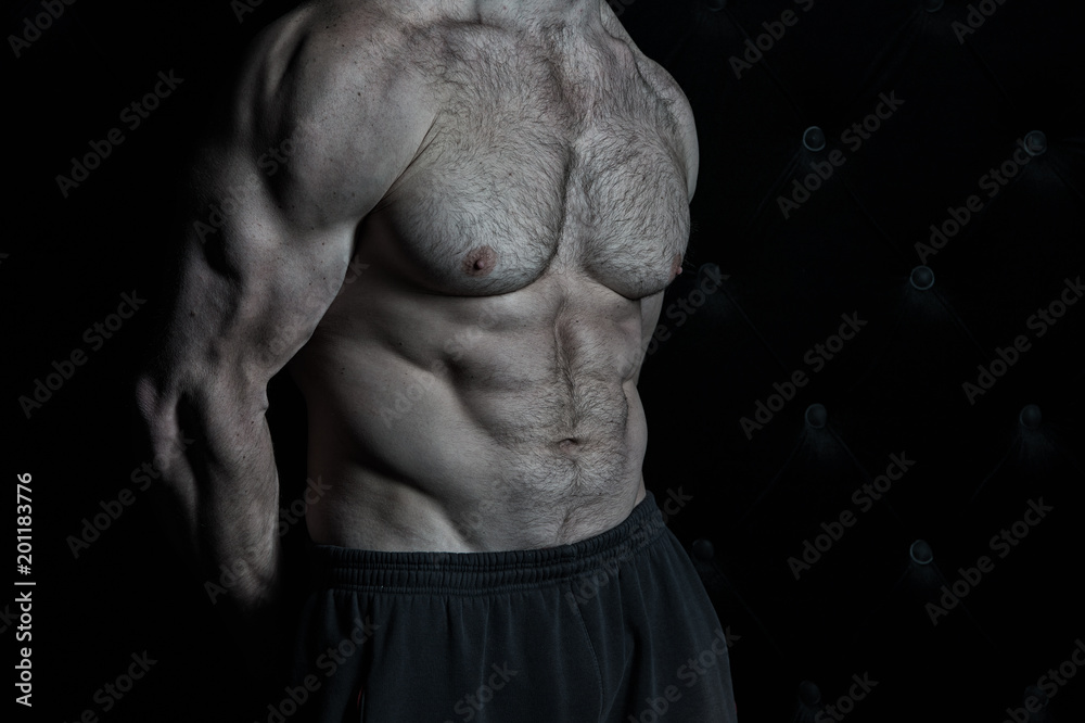 Muscular torso of strong athletic fitness model. Torso showing six pack ...