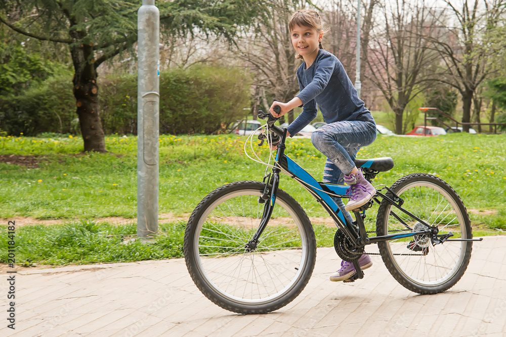 Girl rides a bike