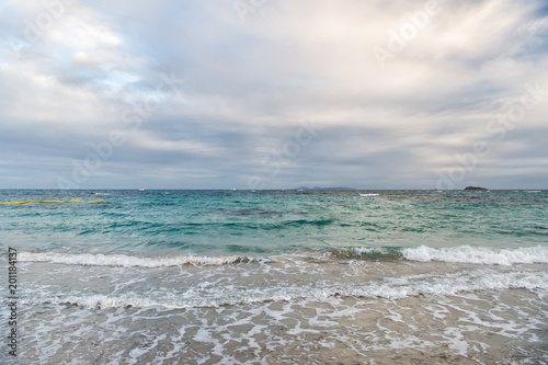 Cloud sky over sea waves in philipsburg  sint maarten. Clouds on sky  white cloudscape.