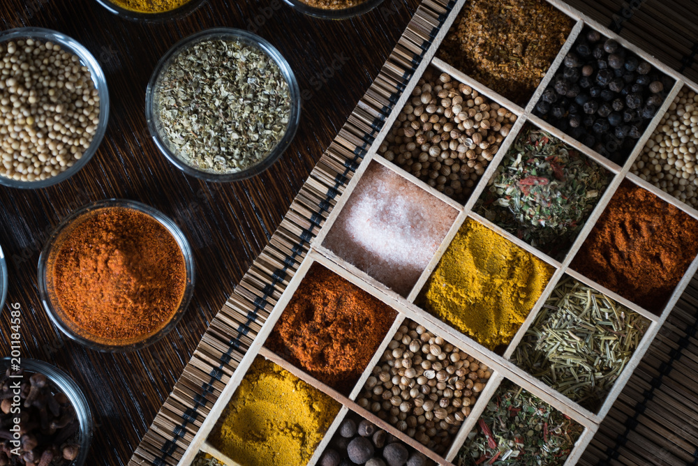 Wooden table of colorful spices Wooden table of colorful spices