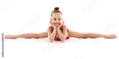 girl gymnast doing sports in rhythmic gymnastics on white background