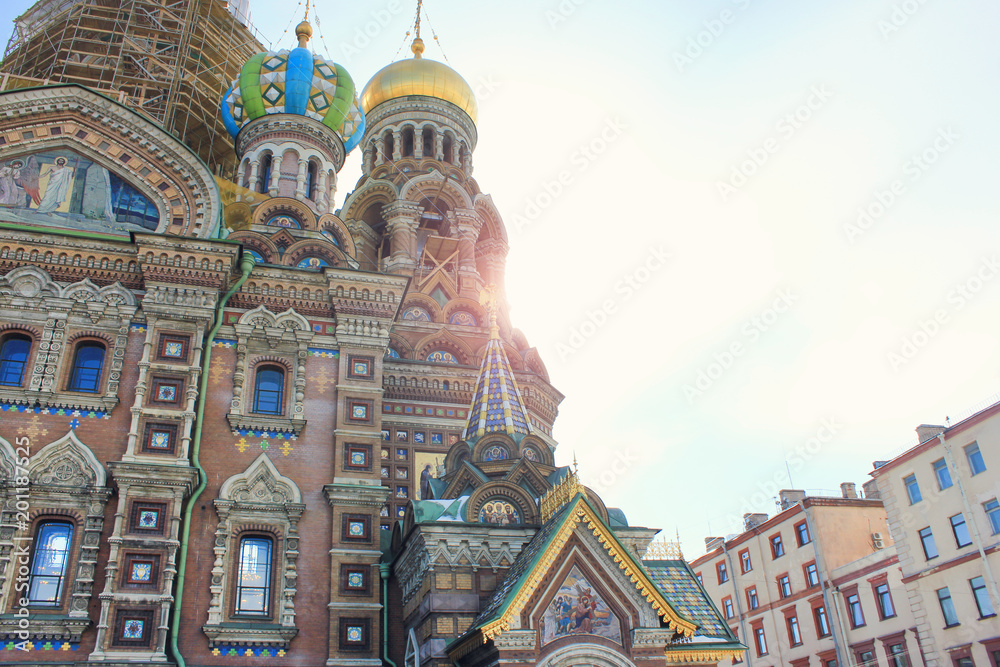Church of Our Savior on Spilled Blood (Church of the Resurrection of Jesus Christ) in Saint Petersburg, Russia. Religious Cultural City Landmark Wallpaper on Sunny Day with Empty Copy Space.