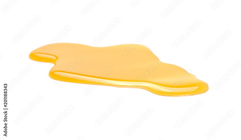 Puddle of orange juice isolated on white background, clipping path Puddle of orange juice isolated on white background, clipping path