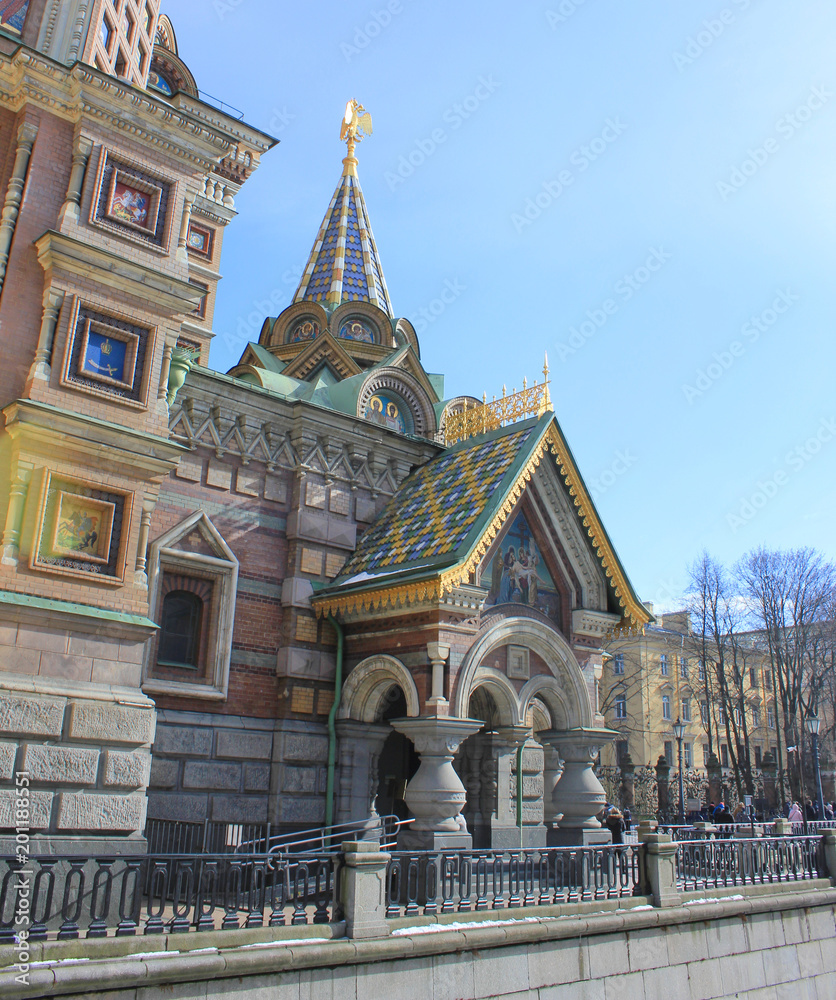 Church of Our Savior on Spilled Blood Decorative Exterior Facade View in St. Petersburg, Russia. Outdoor Image of Popular Tourist Landmark in St. Petersburg City Center on Sunny Day Background.