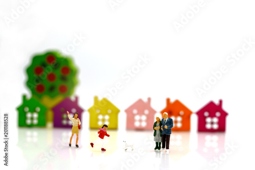 Miniature people, children and family enjoy with dog , happy family day concept.