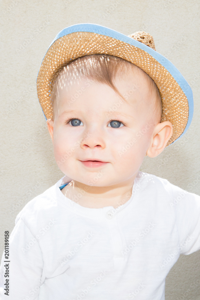 happy young schoolboy outdoor in summer with hat happy young schoolboy outdoor in summer with hat