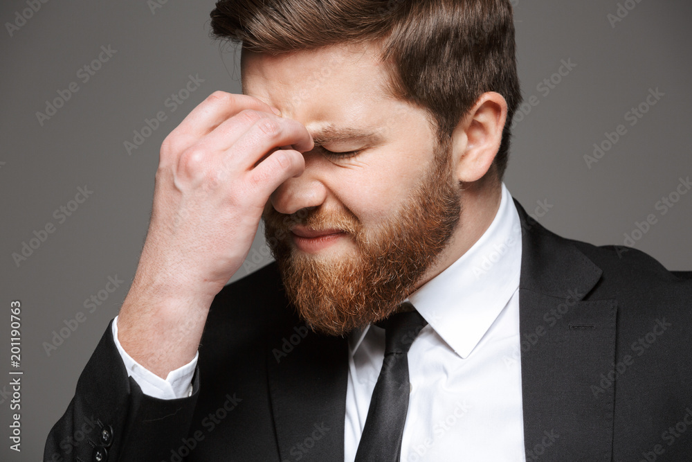 Close up portrait of a pensive young businessman Close up portrait of a pensive young businessman