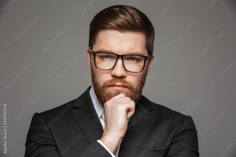 Close up portrait of a pensive young businessman Close up portrait of a pensive young businessman